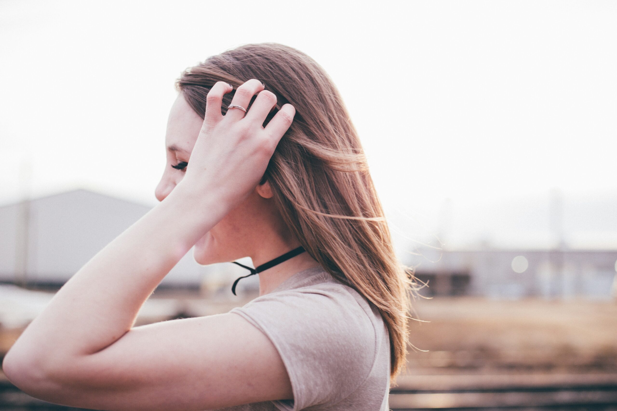 girl with hand in hair